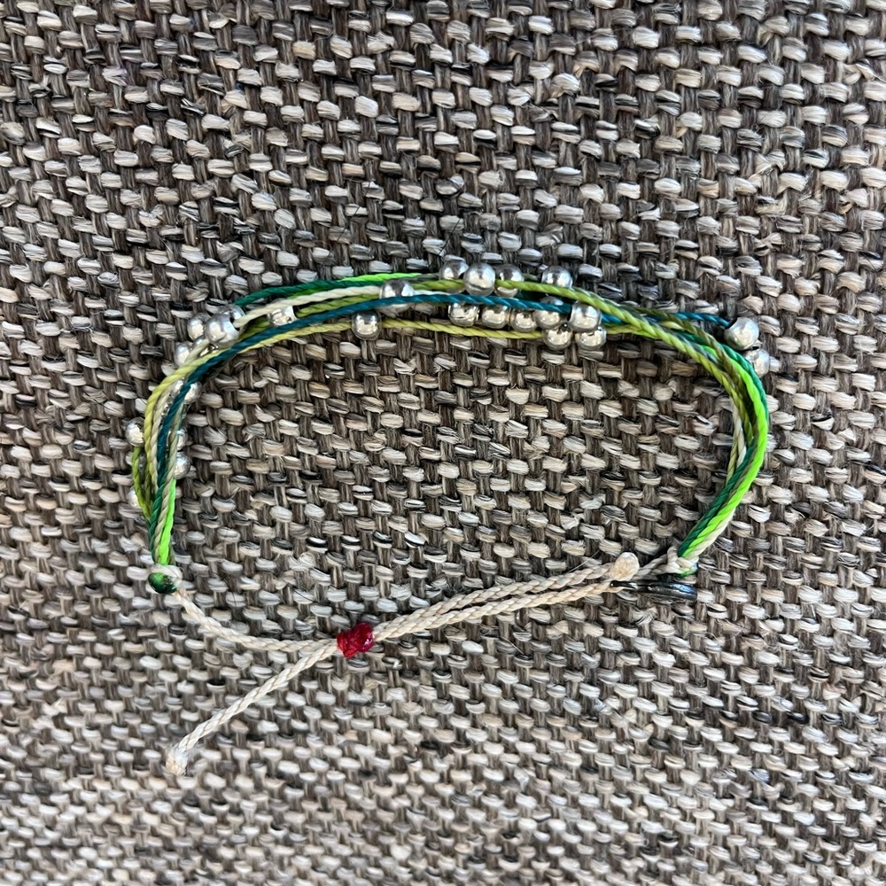 Green beaded Pura Vida bracelet